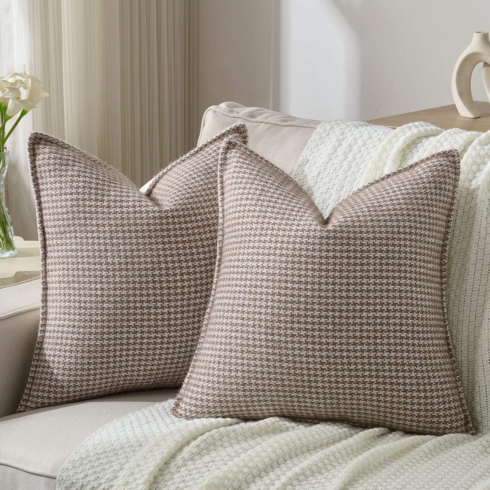 Houndstooth pillows and an ivory throw for fall